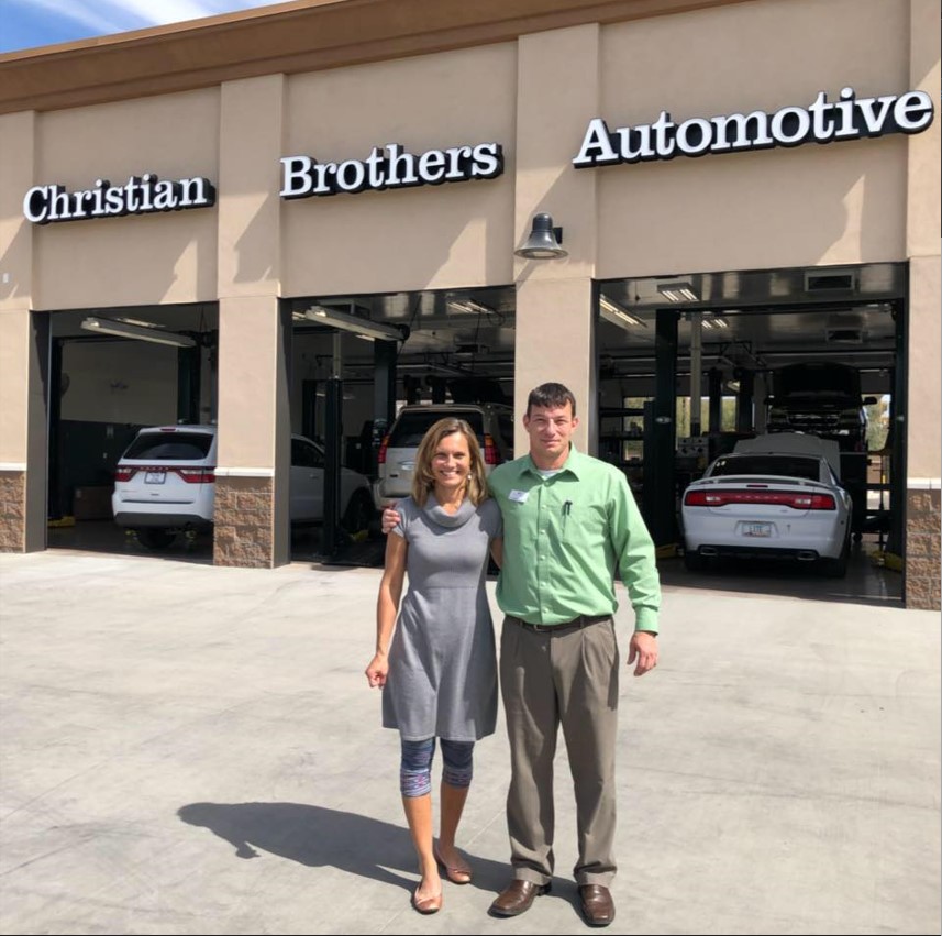 CBAC car in front of shop
