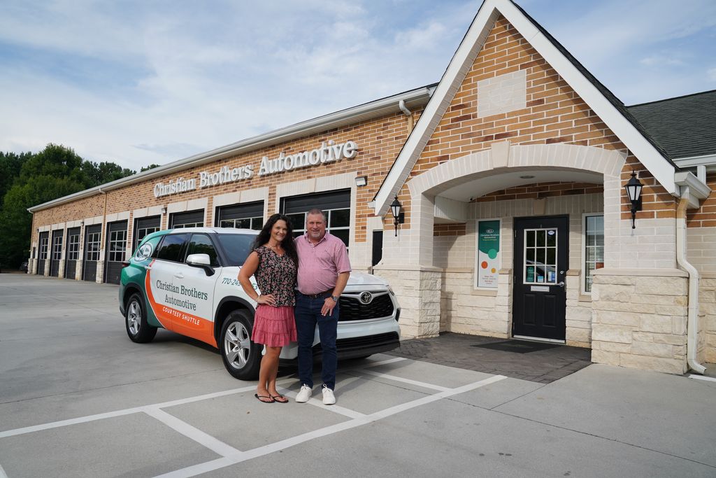 CBAC car in front of shop