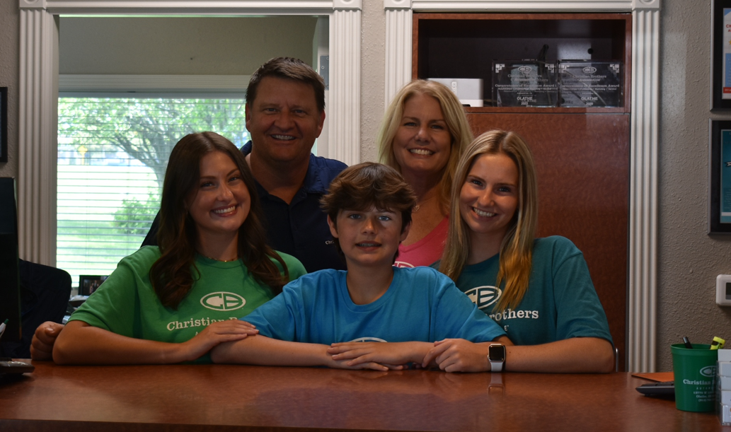 CBAC car in front of shop